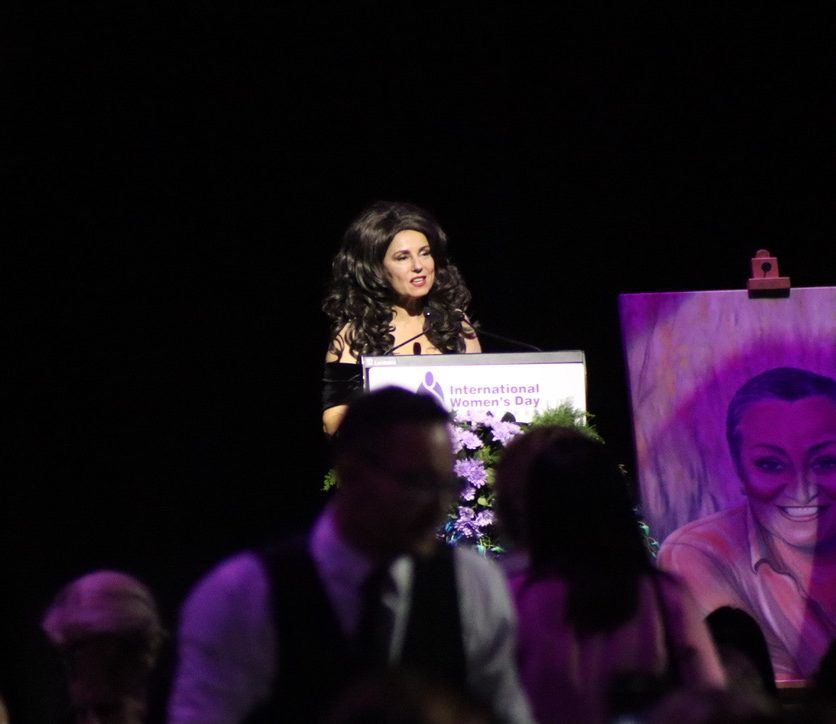 Effie on stage speaking at the Illawarra International Women's Day Luncheon. Source: Shayla Carl
